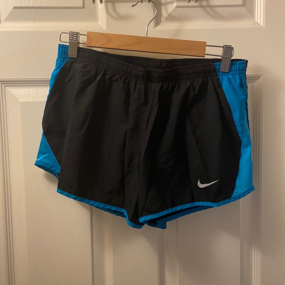 2 pairs. Nike Dri-Fit running shorts. Size M